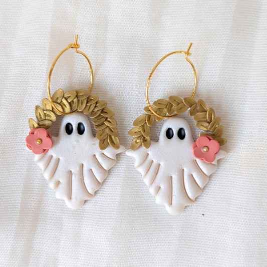 Pearlescent botanical ghost earrings with gold leaf crowns, coral flowers, and gold hoops