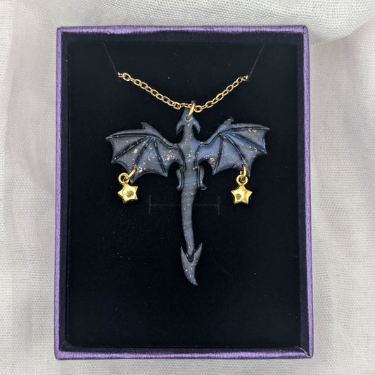 Marbled purple blue and black dragon necklace with gold chain and two petite star charms