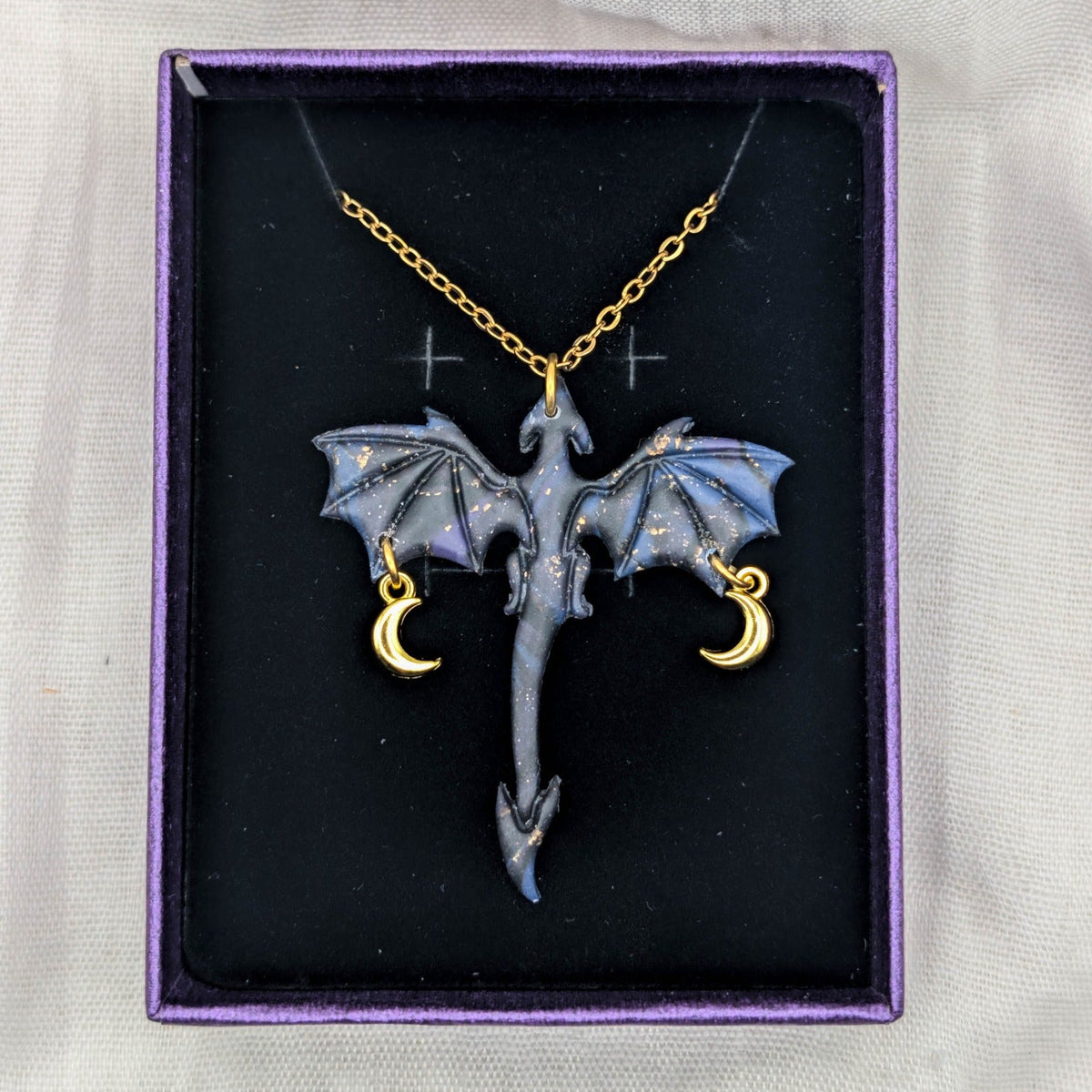 Marbled dragon pendant necklace with gold chain and two dangling crescent moon charms