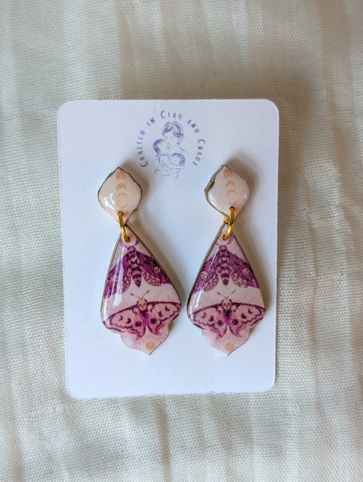 Pink moth gothic teardrop polymer clay earrings with gold accents