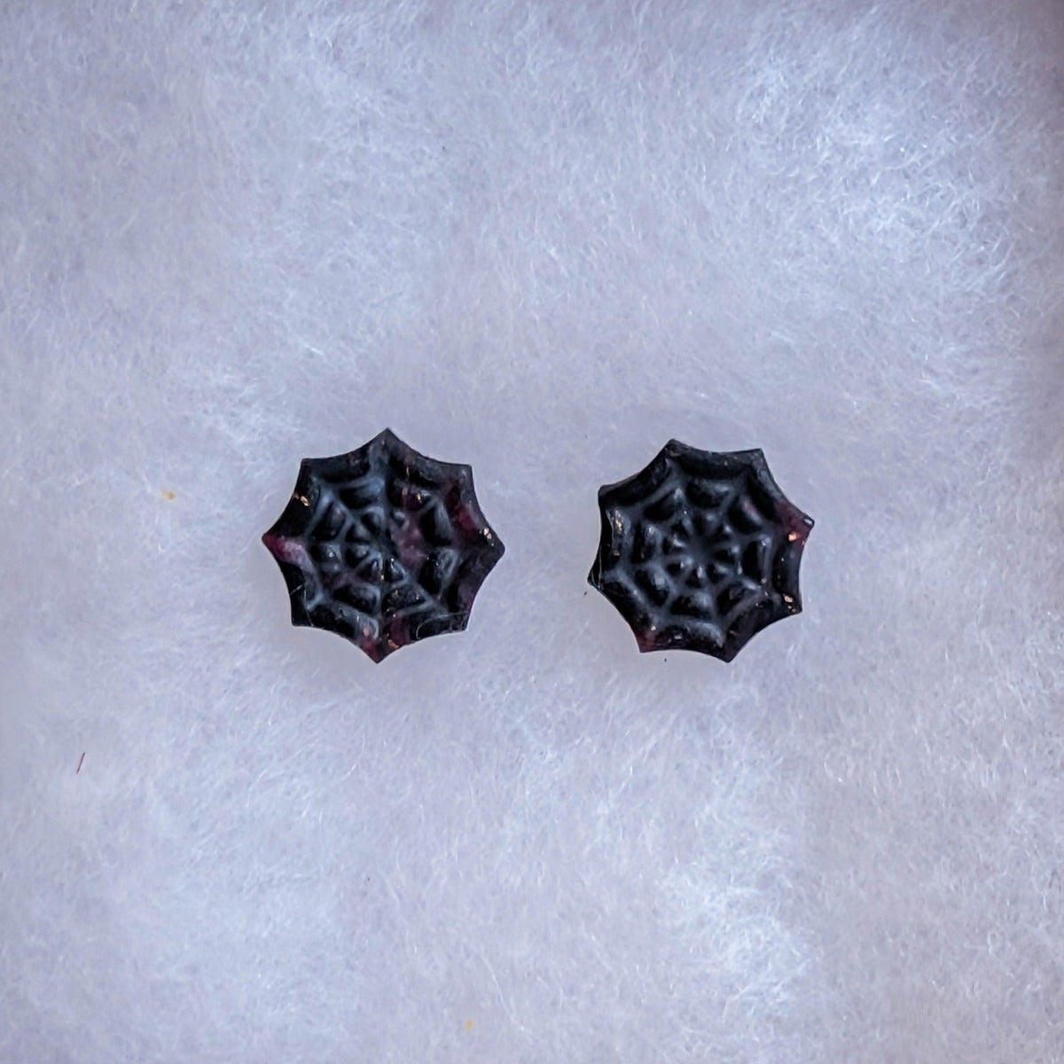 Dark crimson and black marbled cobweb stud earrings