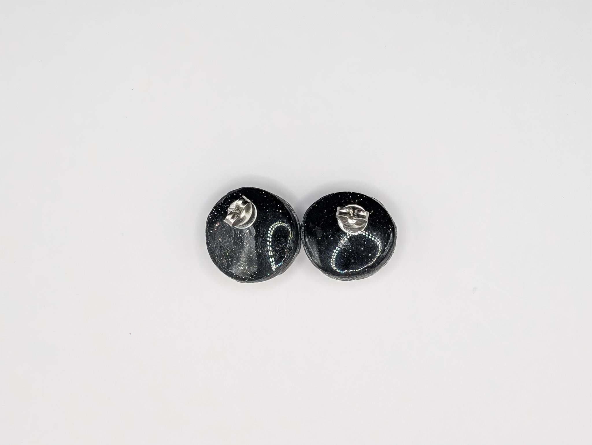 Sculptural Black Stud Earrings with Silver Rope Detail