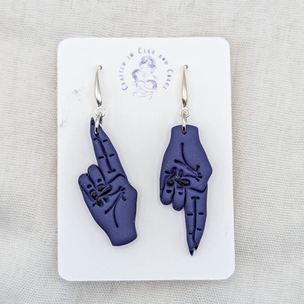 As Above, So Below mystical blue hand earrings with black painted nails and silver-plated hooks