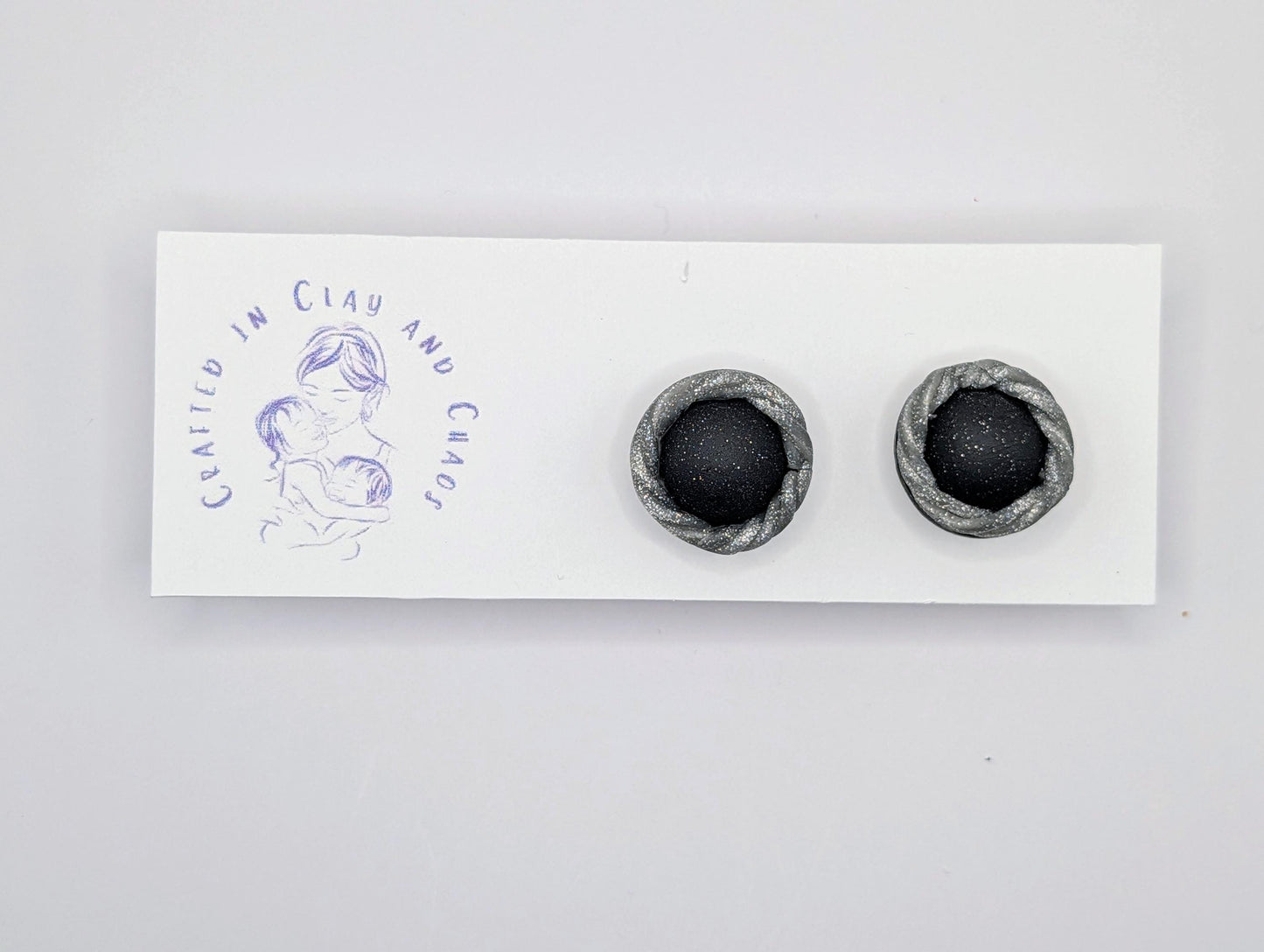 Sculptural Black Stud Earrings with Silver Rope Detail