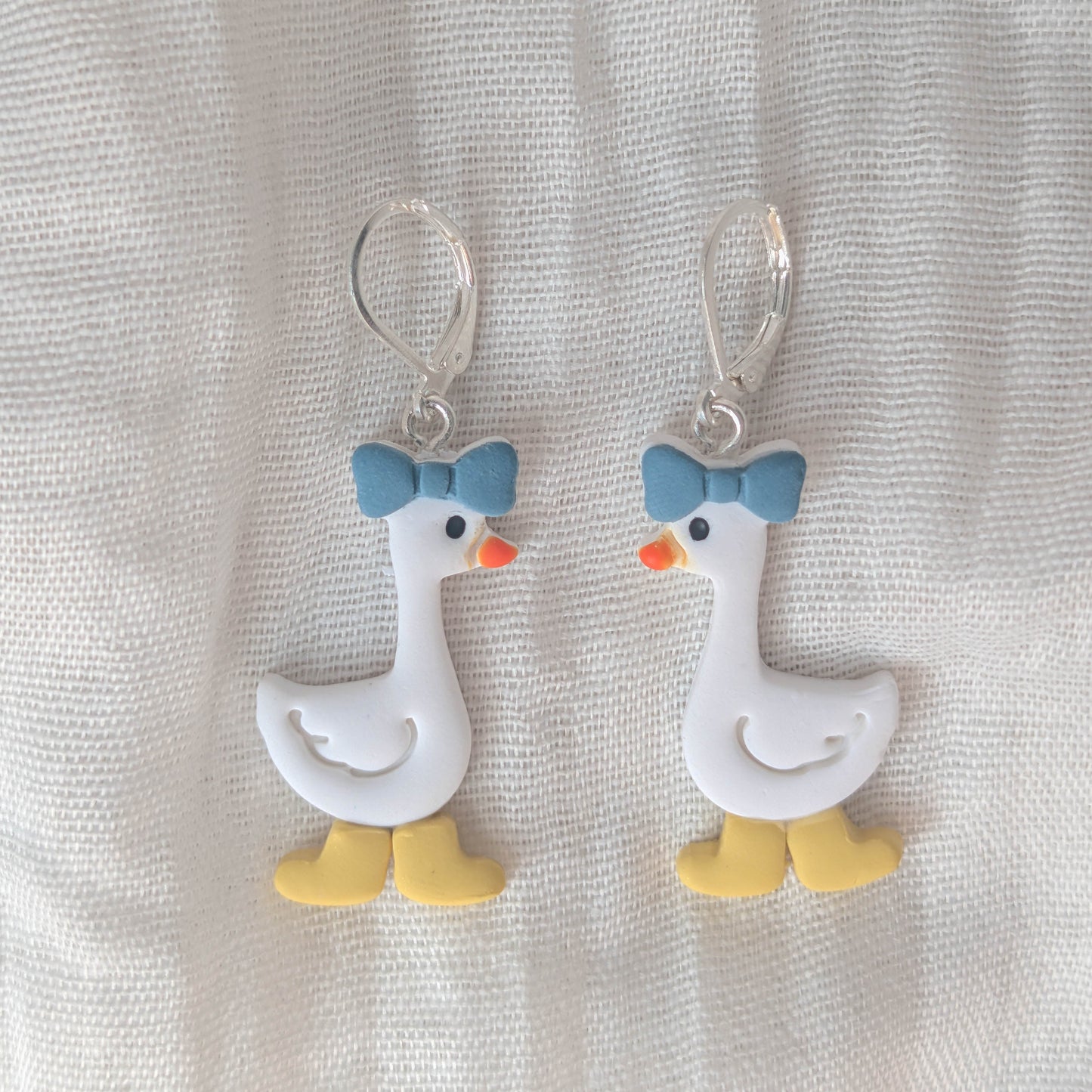 Handmade Whimsical Goose Clay Earrings with Cute Bow and Rainboots
