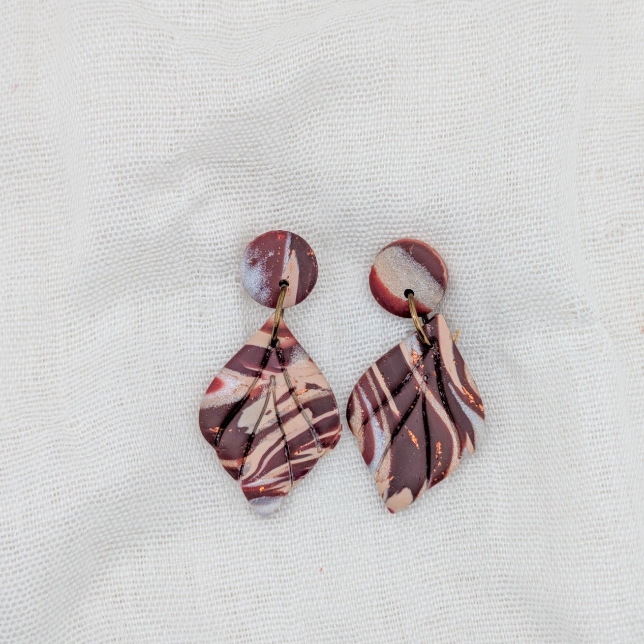 Brown marble leaf dangle earrings with round stud tops and etched leaf veins