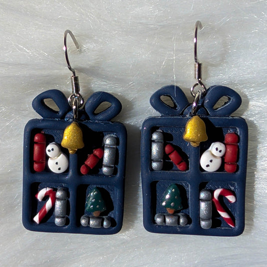 Midnight blue Christmas bookcase earrings with snowmen, candy canes, bells and silver-tone hooks
