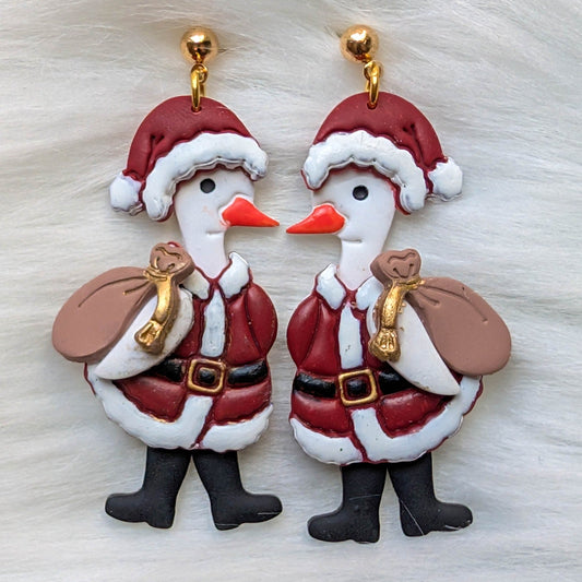 Pair of Santa Goose earrings with red Santa hats, gift sacks, and gold-plated stainless steel ball posts