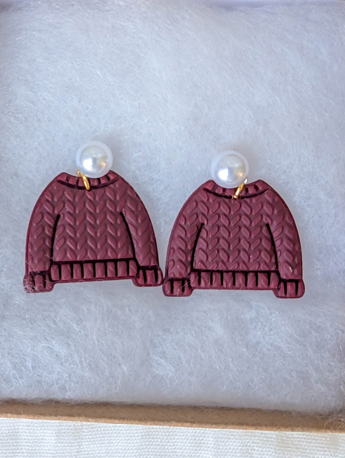 Crimson handmade cable-knit sweater earrings with faux pearl posts