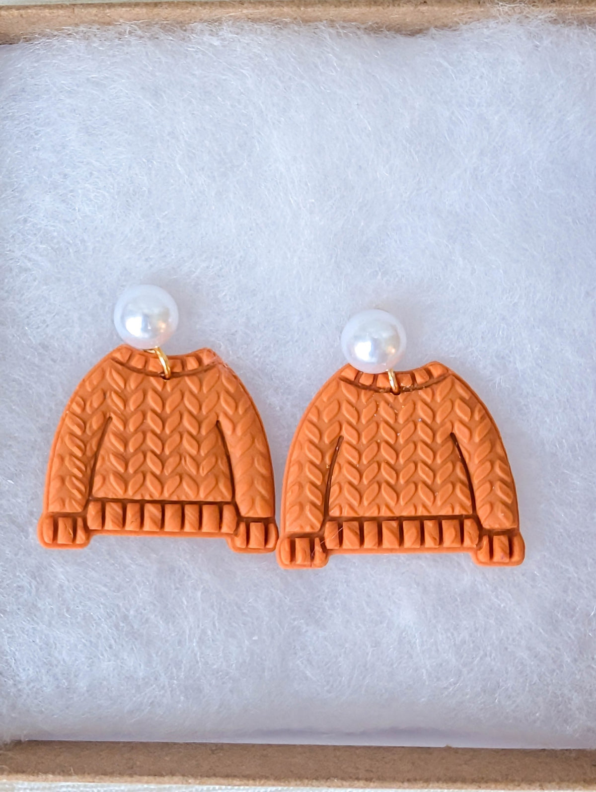 Crimson polymer clay sweater earrings with ribbed trim and faux pearl posts