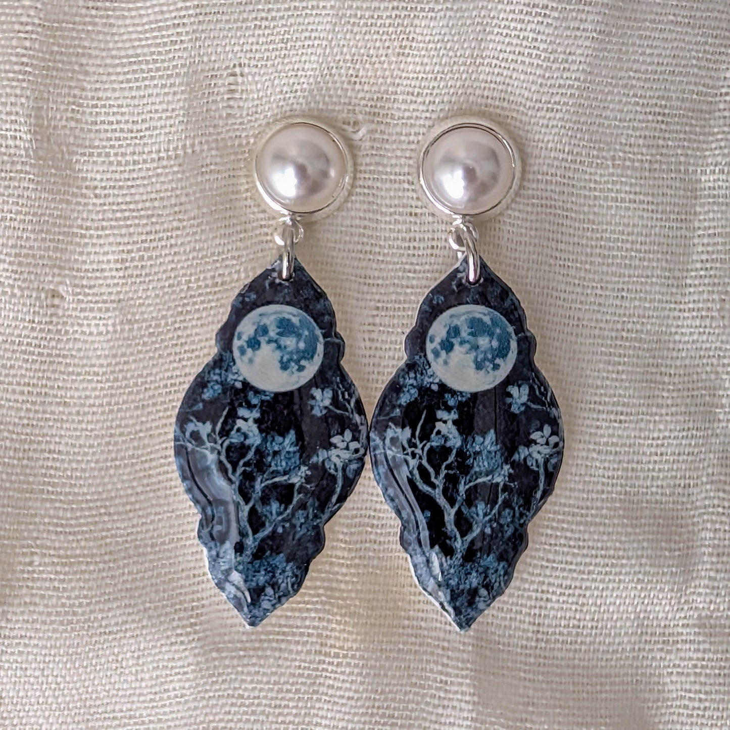 Blue moon curvy frame earrings with faux pearl posts and icy floral details