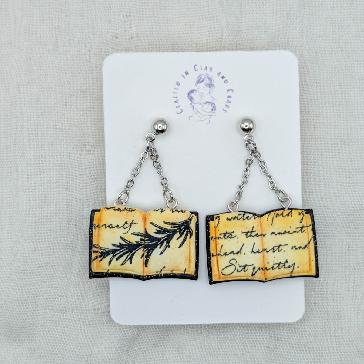 Black Sparkle open spellbook earrings with silver findings