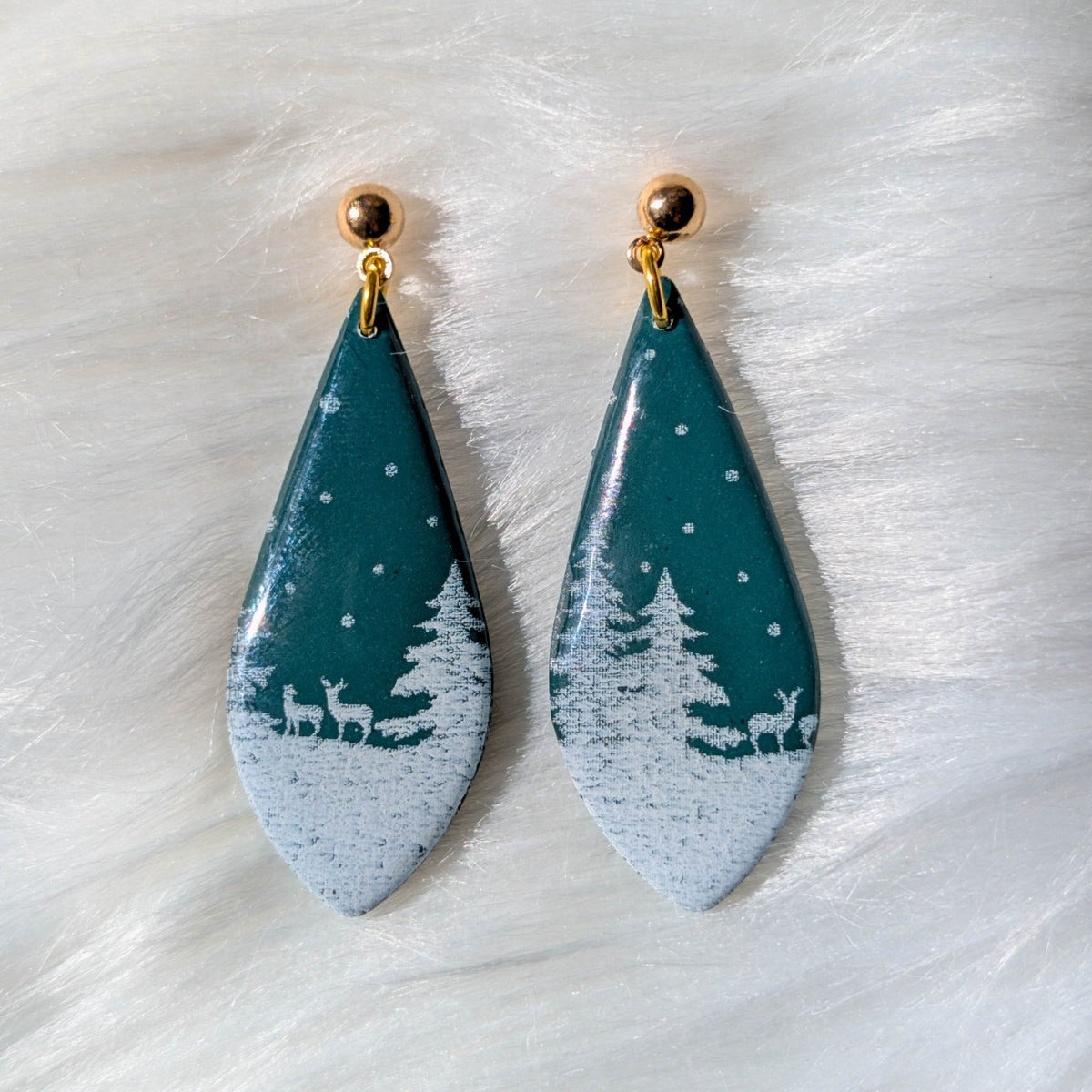 Green long teardrop snowy forest earrings with white trees, deer and gold-plated stainless steel findings