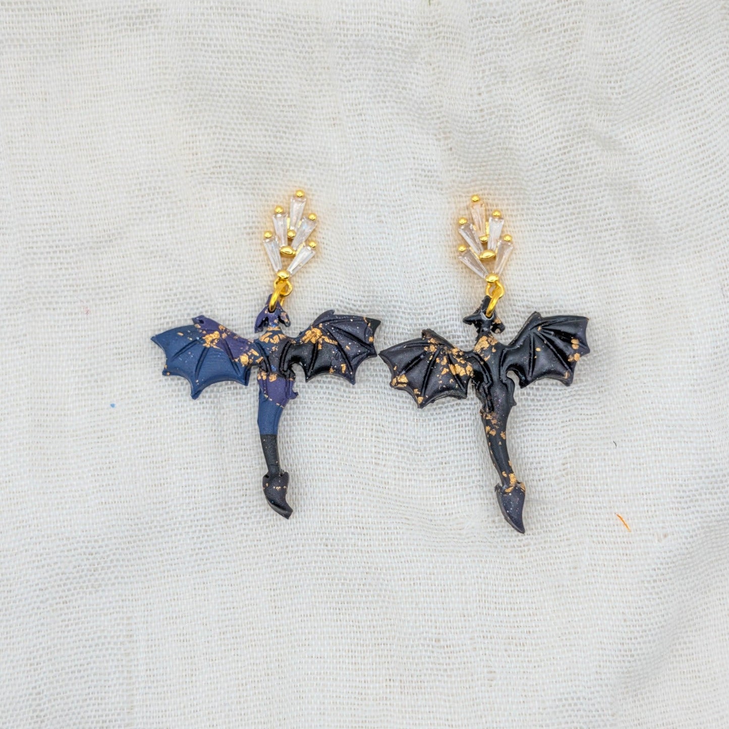 Small gold-flecked midnight marble dragon earrings with 18K gold-plated cubic zirconia leaf studs