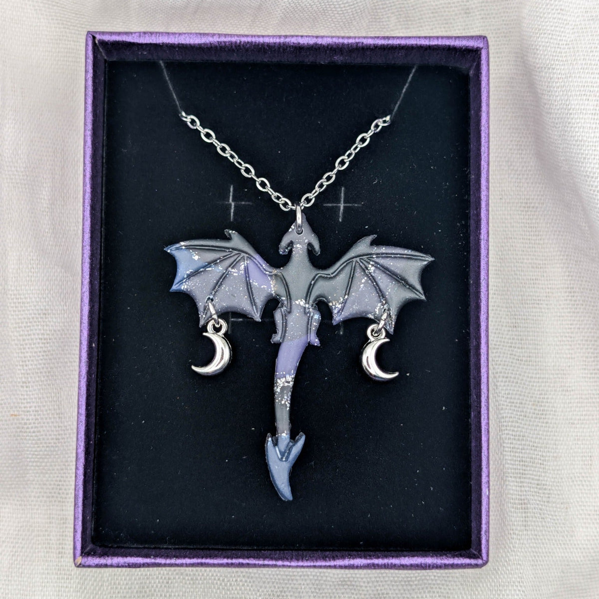Marbled dragon necklace with silver chain and two dangling crescent moon charms