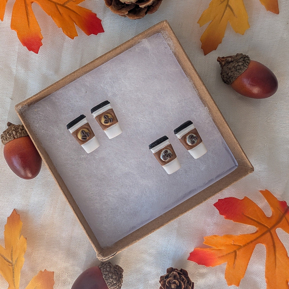 Handmade takeout coffee cup stud earrings with gold and silver accents