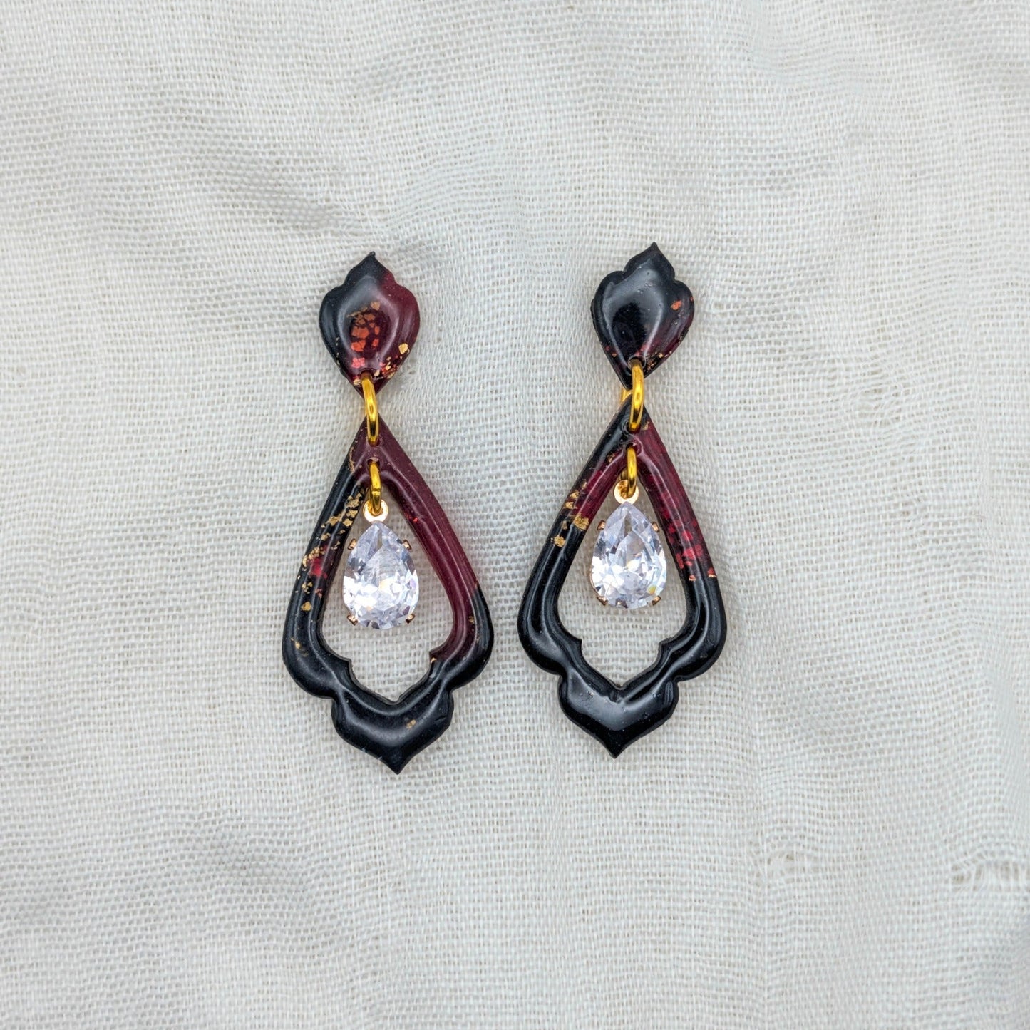 Gold Cathedral Teardrop vampire marble earrings with cubic zirconia dangles