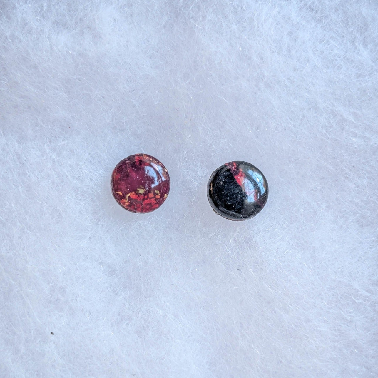 Small translucent crimson and black round vampire marble stud earrings