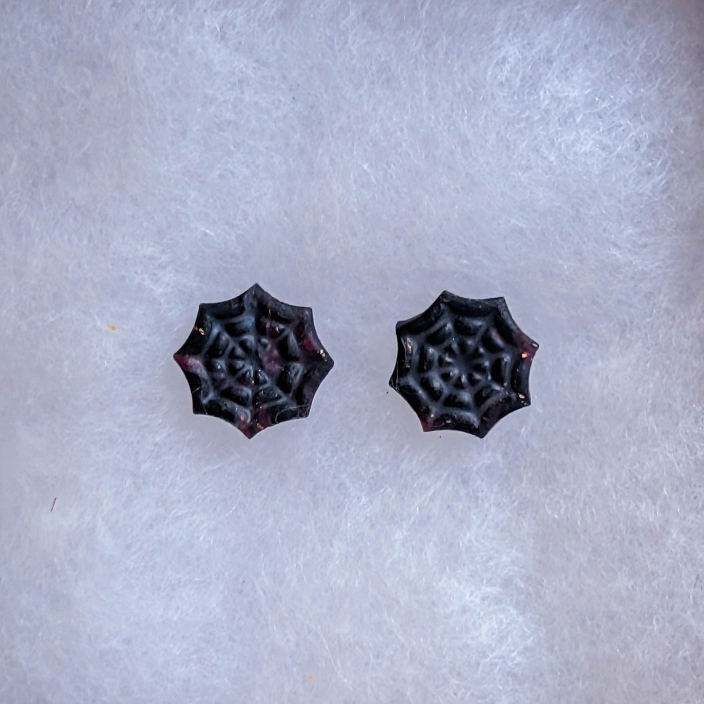 Dark crimson and black marbled cobweb stud earrings