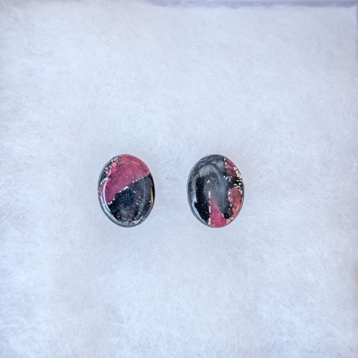 Translucent crimson and black oval vampire marble stud earrings