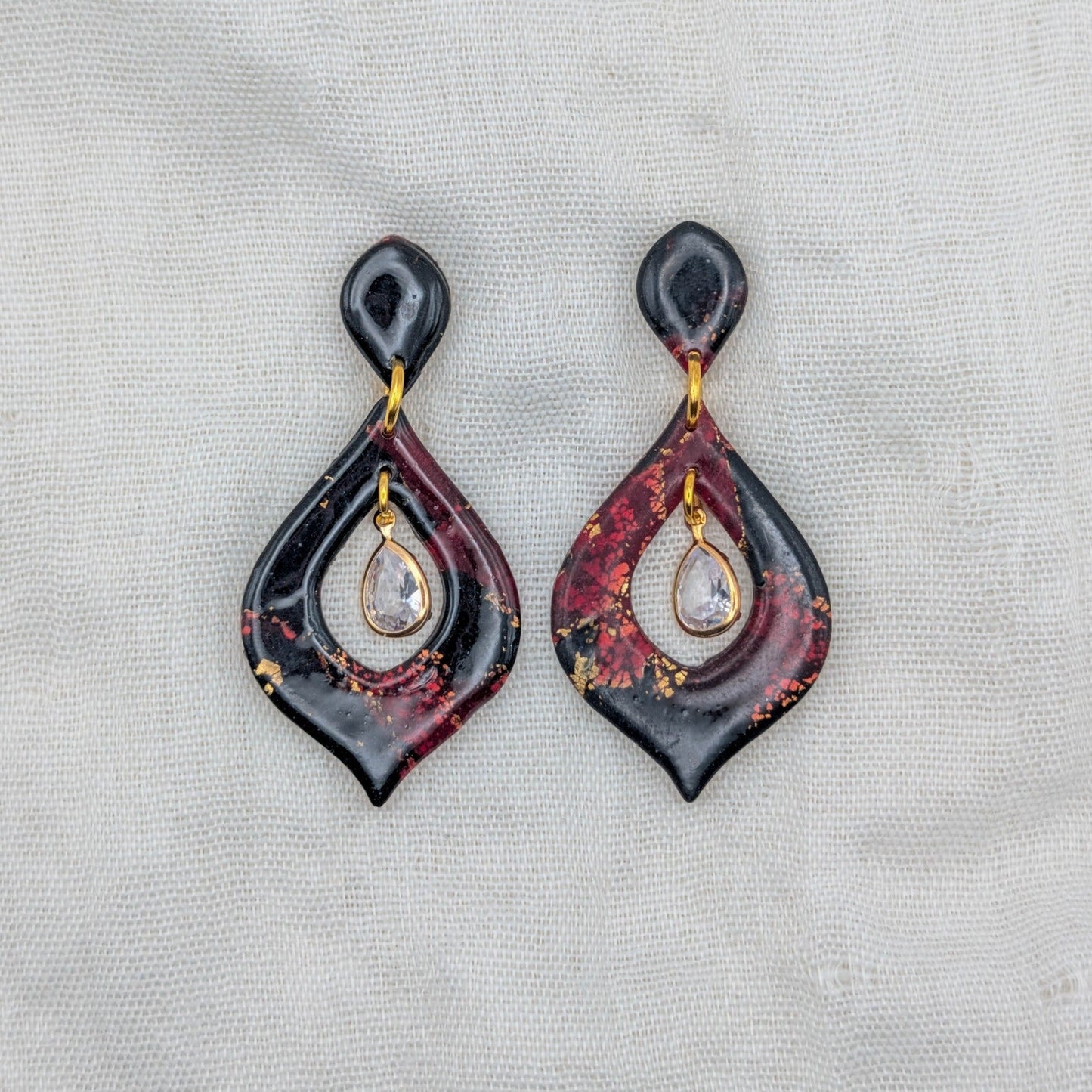 Gold Wide Teardrop vampire marble earrings with sparkling cubic zirconia drops